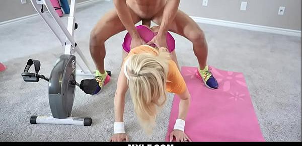  Amazing milf workouts while riding a pink dilido on her stationary bike